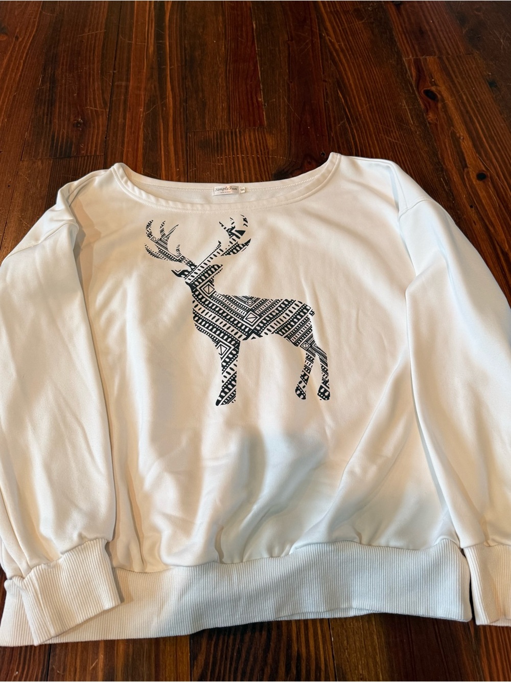 Women’s White Sweatshirt with Black Reindeer Graphic